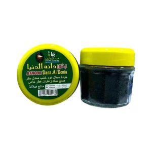 Dana Al Donia Bakhoor in yellow glass jar